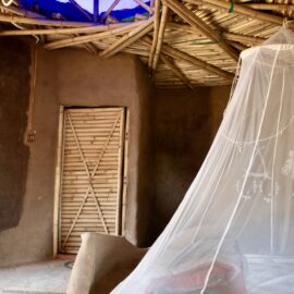 Earthen cottage with bamboo roof